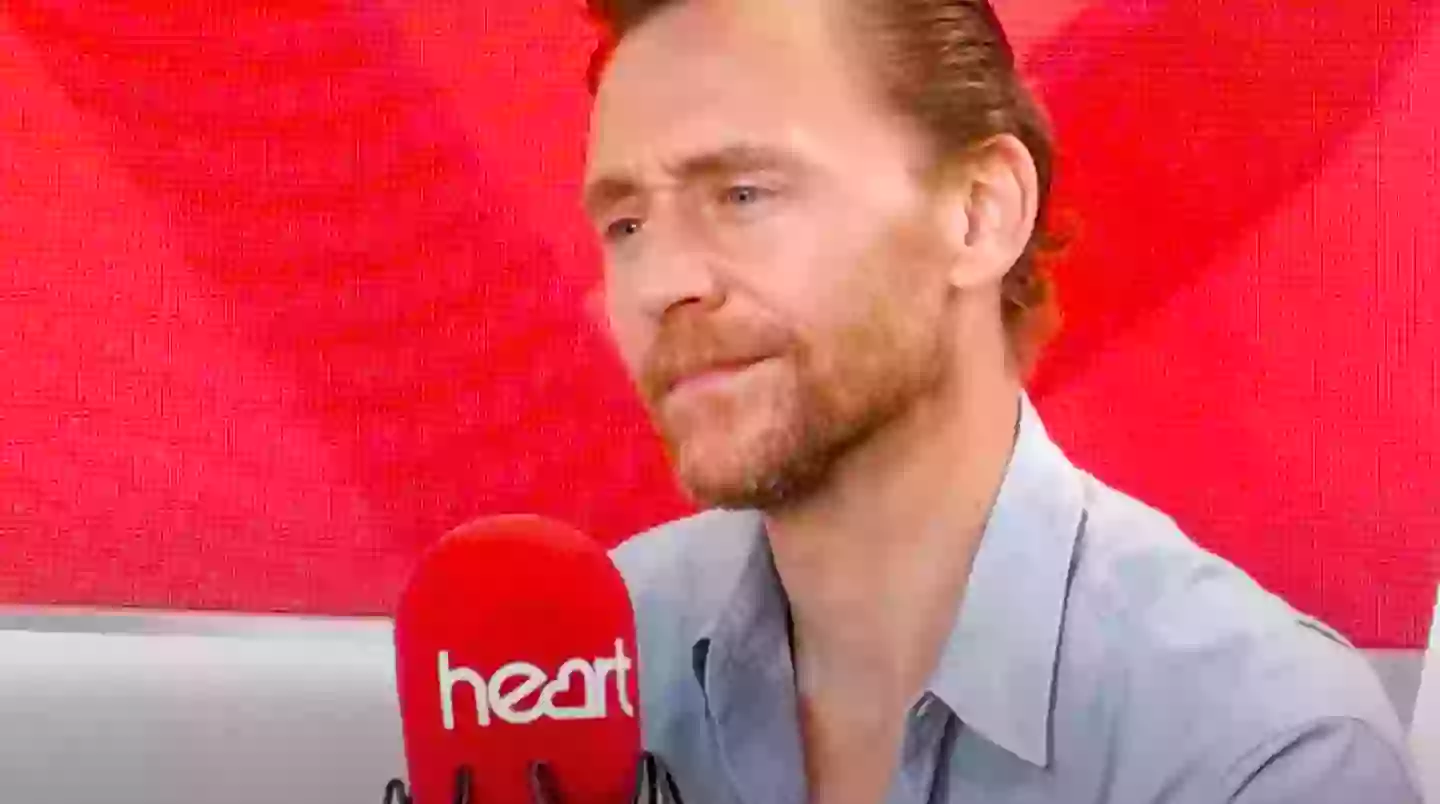 Hiddleston looked pretty confused at first (YouTube/Heart)