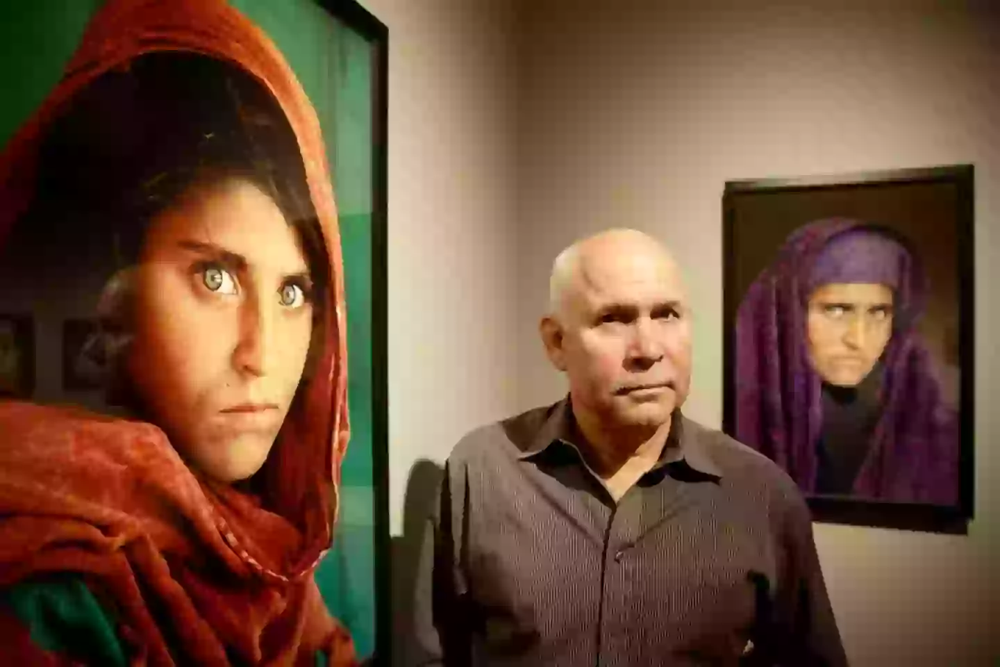The photo on the right of McCurry was taken in 2002 (ULRICH PERREY/DPA/AFP via Getty Images)