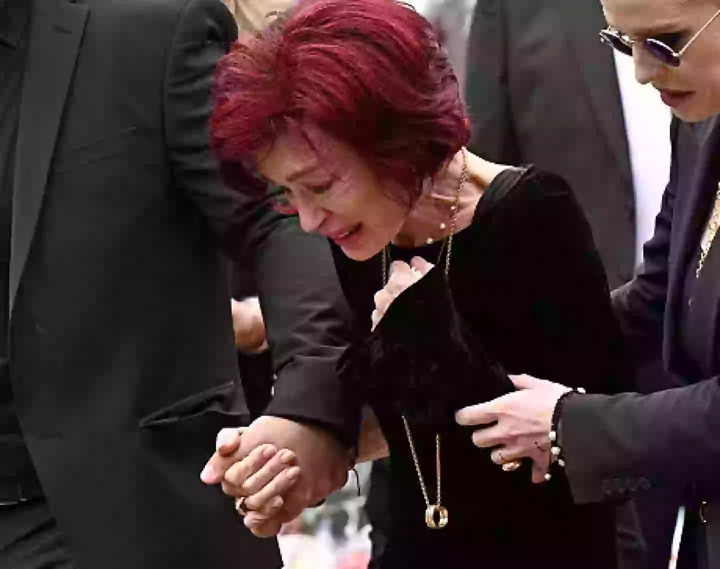 Sharon could be seen with the ring around her neck (Leon Neal/Getty Images)