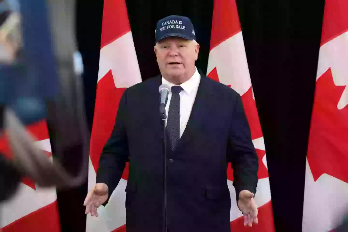 Ontario's Premier Doug Ford wearing a 'Canada Is Not For Sale' hat in January (David Kawai/Bloomberg via Getty Images)