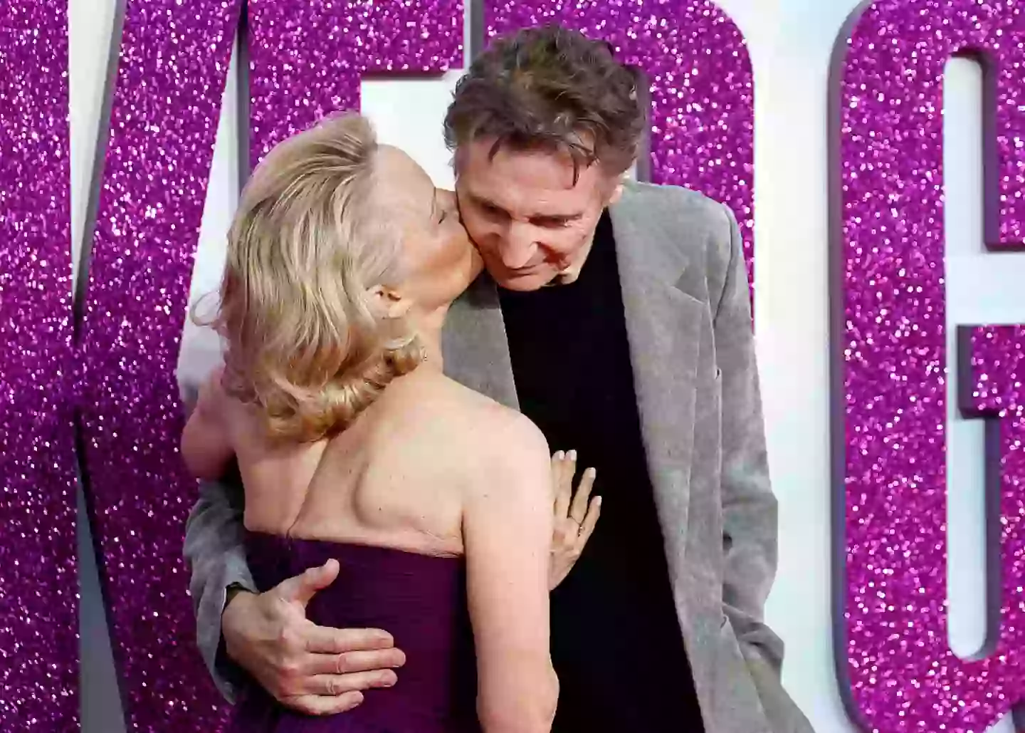 The pair packed on the PDA at the red carpet (John Phillips/Getty Images)