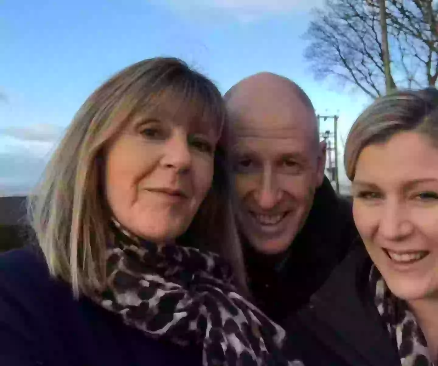 Ronnie (SWNS) with Beth and Anne