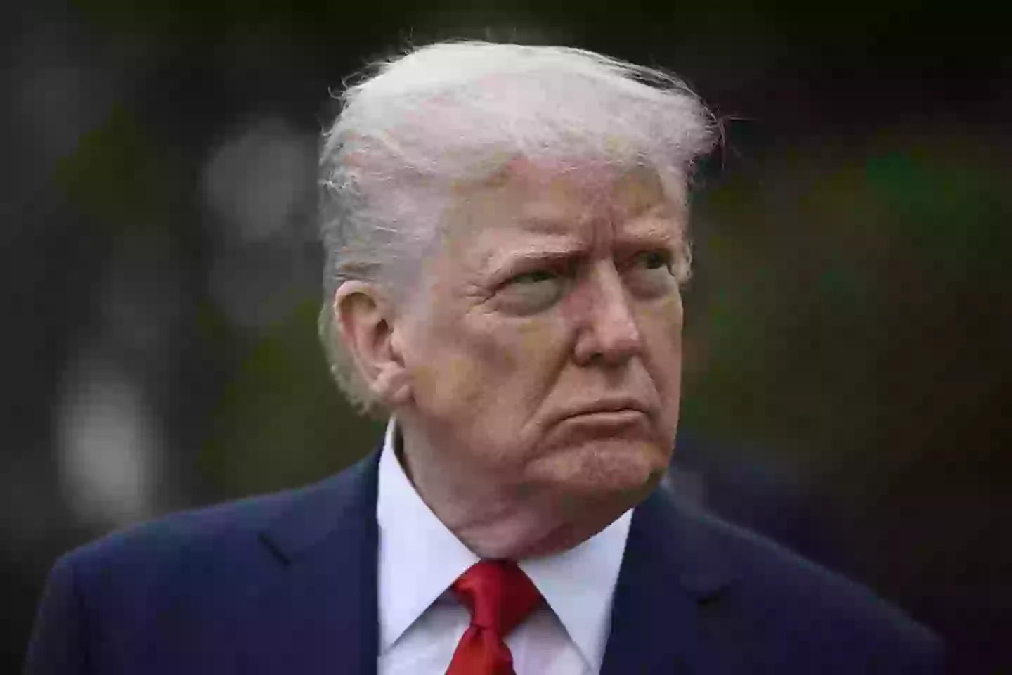 Trump is set to attend the funeral along with his wife, Melania (BRENDAN SMIALOWSKI/AFP via Getty Images)