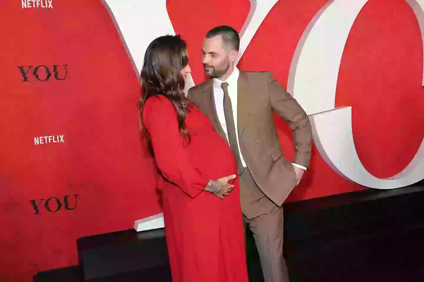 Badgley and his wife, Domino Kirke-Badgley, at the You season 5 premiere in New York (Michael Loccisano/WireImage)