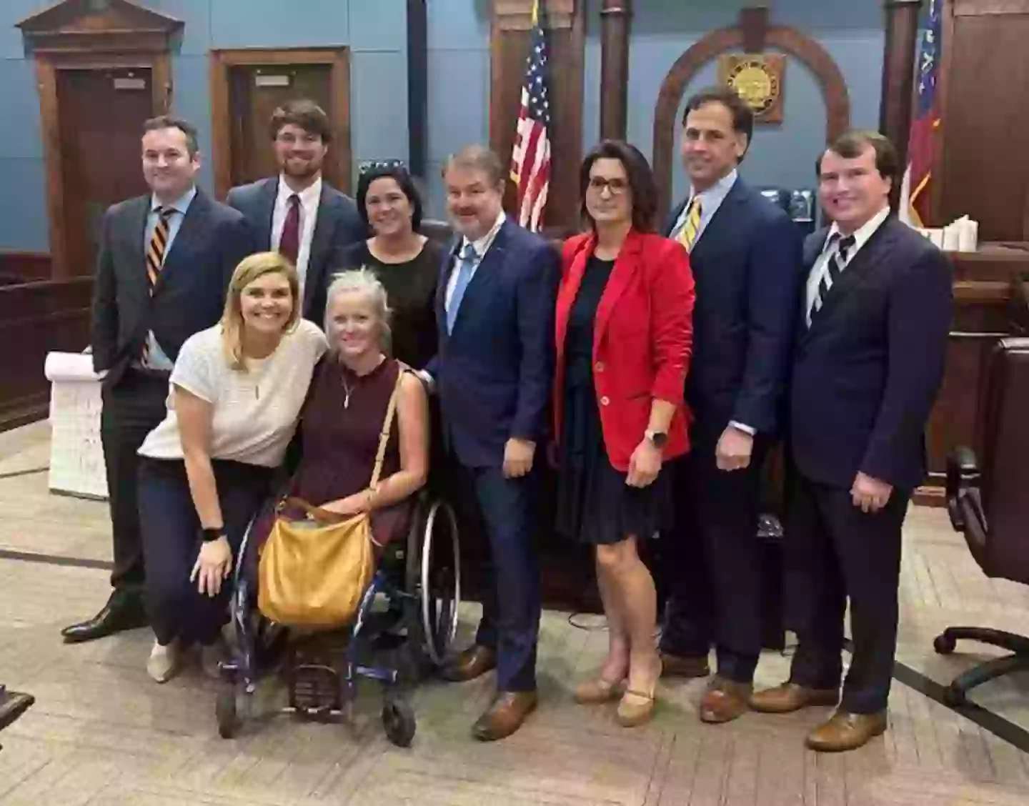 Jessica pictured with her legal team from Cook Law Group LLC (Facebook)