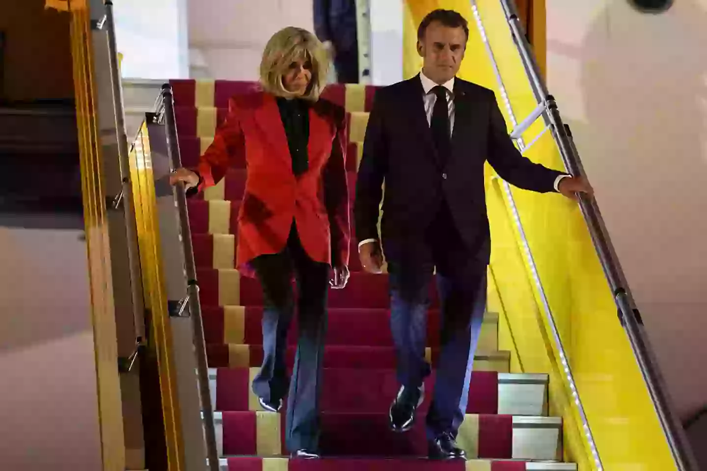 French President Emmanuel Macron and his wife Brigitte Macron pictured just moments after the 'slap' (LUDOVIC MARIN/AFP via Getty Images)