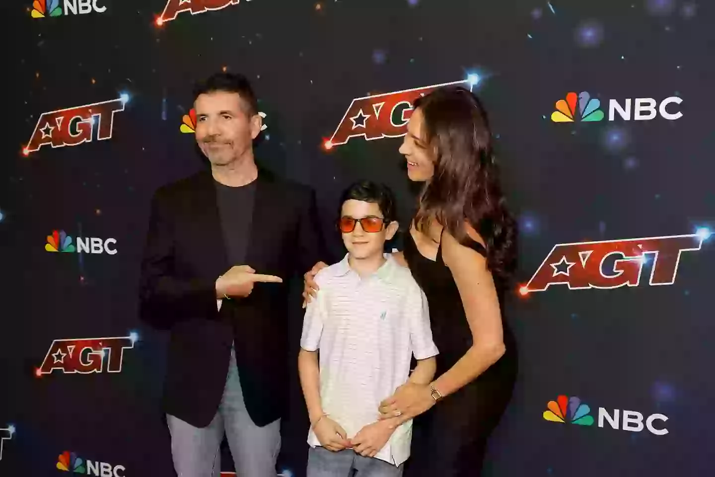 Eric took to the carpet with his parents.