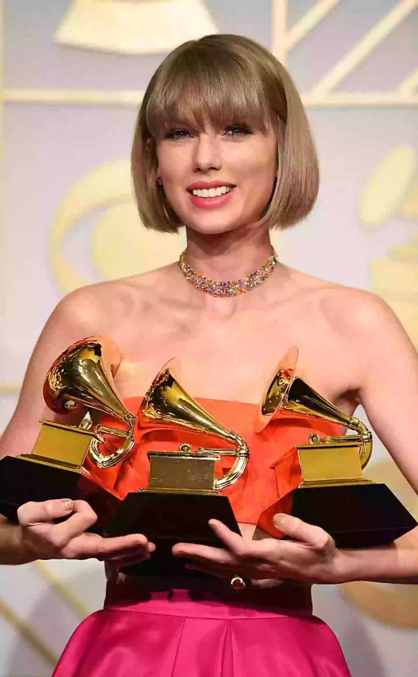 Taylor Swift grips three Grammys in 2016, including one for the Best Music Video award for 'Bad Blood' (Steve Granitz/WireImage)