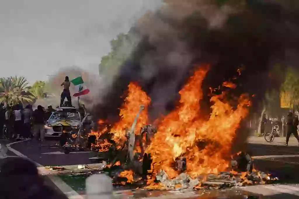 Cars were set alight in the LA protests over the weekend (Jim Vondruska/Getty Images)