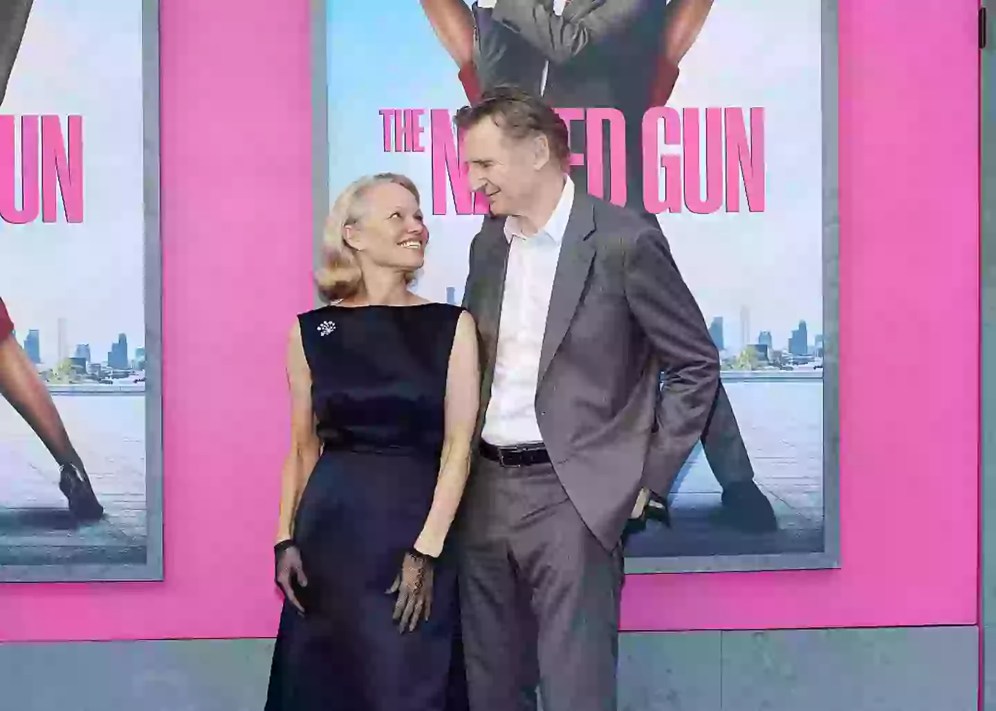 Pamela Anderson and Liam Neeson have been facing rumors since they starred in The Naked Gun (Dia Dipasupil/Getty Images)