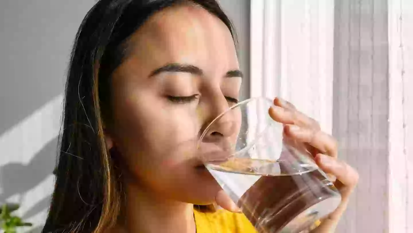 By switching to drinking filtered tap water, you could reduce microplastic consumption by 90 percent (Getty Stock Image)