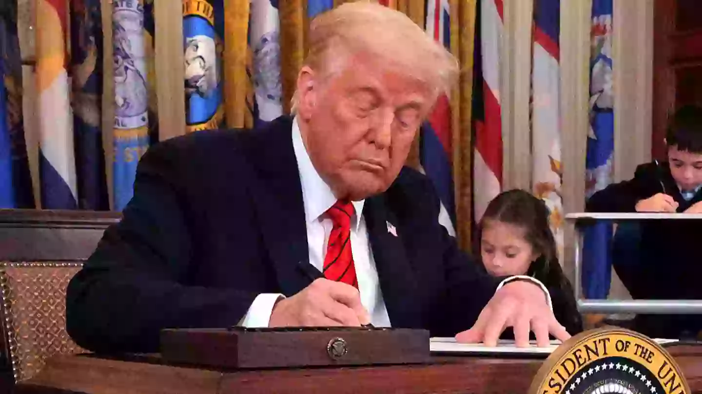 Mysterious 'mark' spotted on Trump's hand again while signing order to end Department of Education