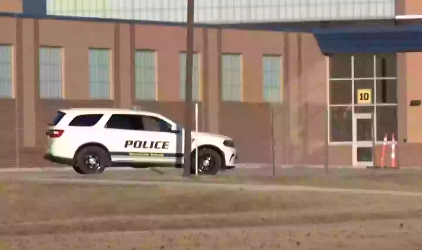 Police outside Moorseville High School following a tip about a mass shooting (WTHR)