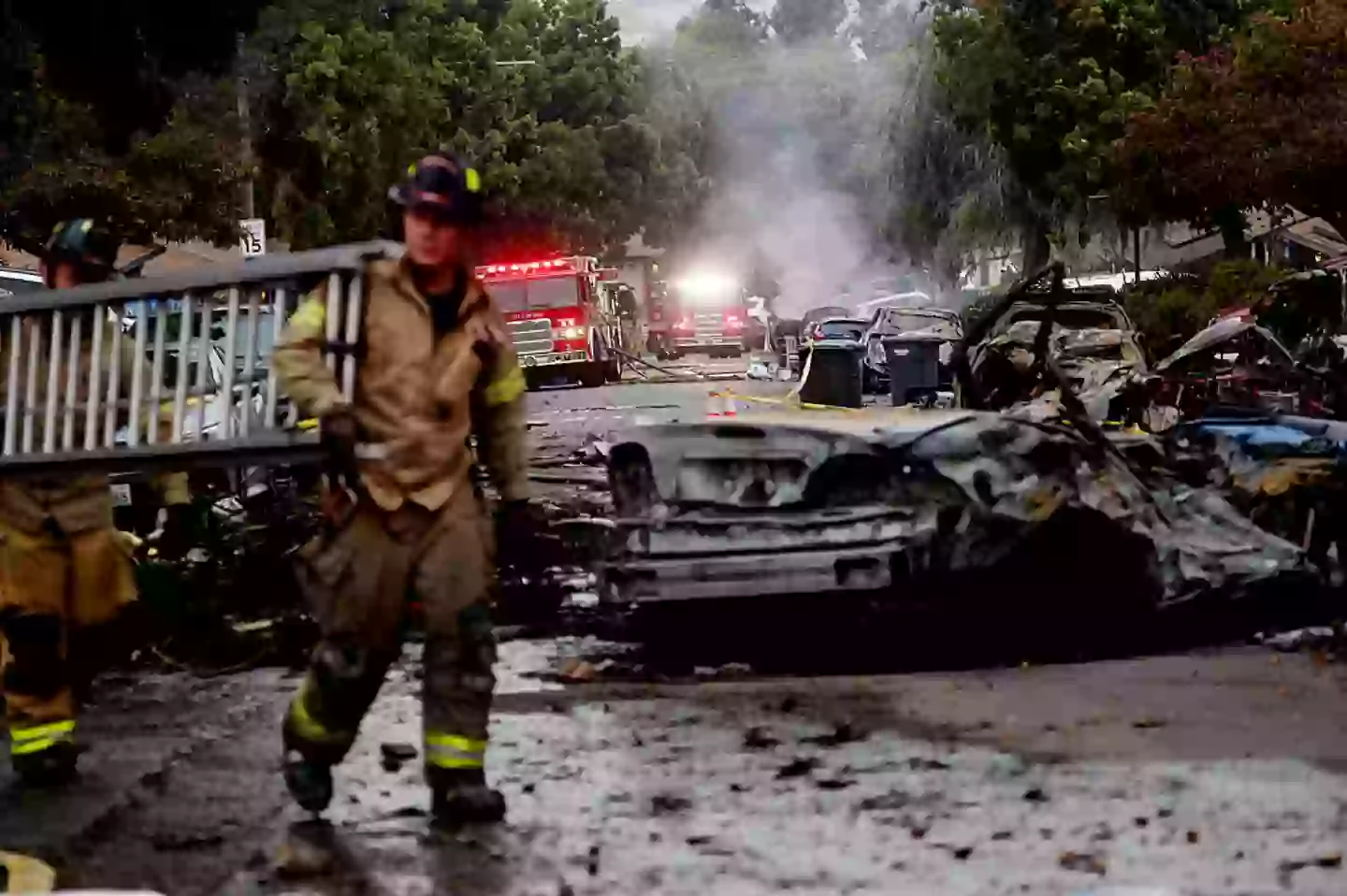 The small private jet crashed in the Murphy Canyon neighborhood on Thursday morning, resulting in the deaths of all six people onboard (SANDY HUFFAKER/AFP via Getty Images)