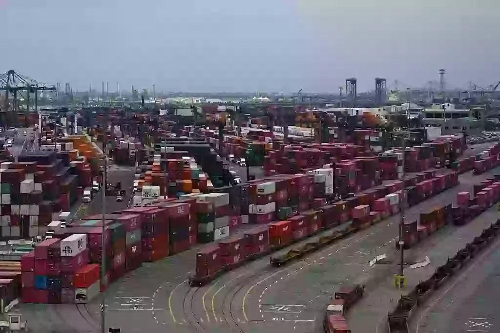 Shipping containers sit stacked on trains at the Port of Los Angeles in San Pedro, California (PATRICK T. FALLON/AFP via Getty Images)
