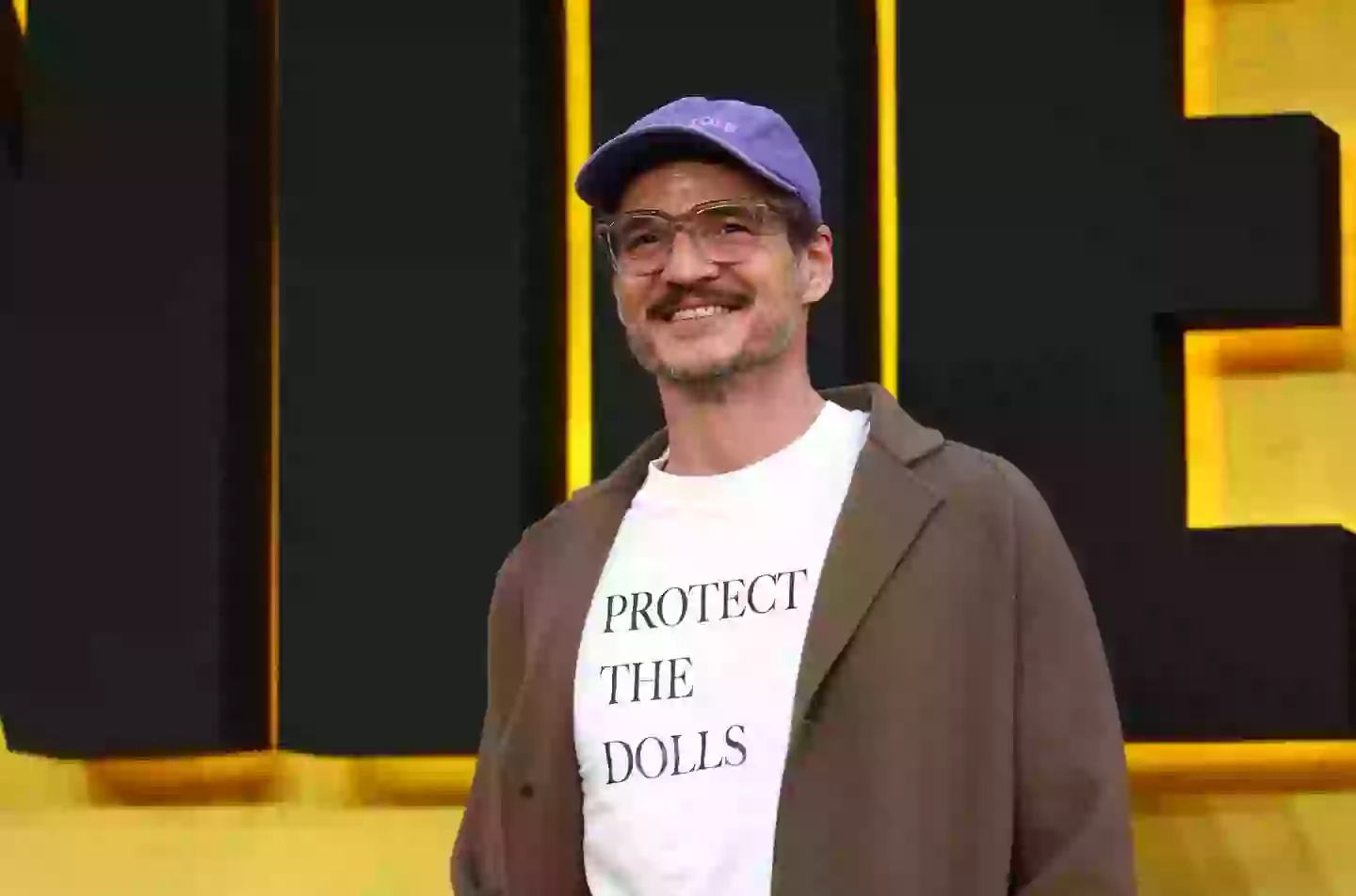 Pedro Pascal seen wearing a 'Protect The Dolls' t-shirt (Tim P. Whitby/Getty Images for The Walt Disney Company Limited)
