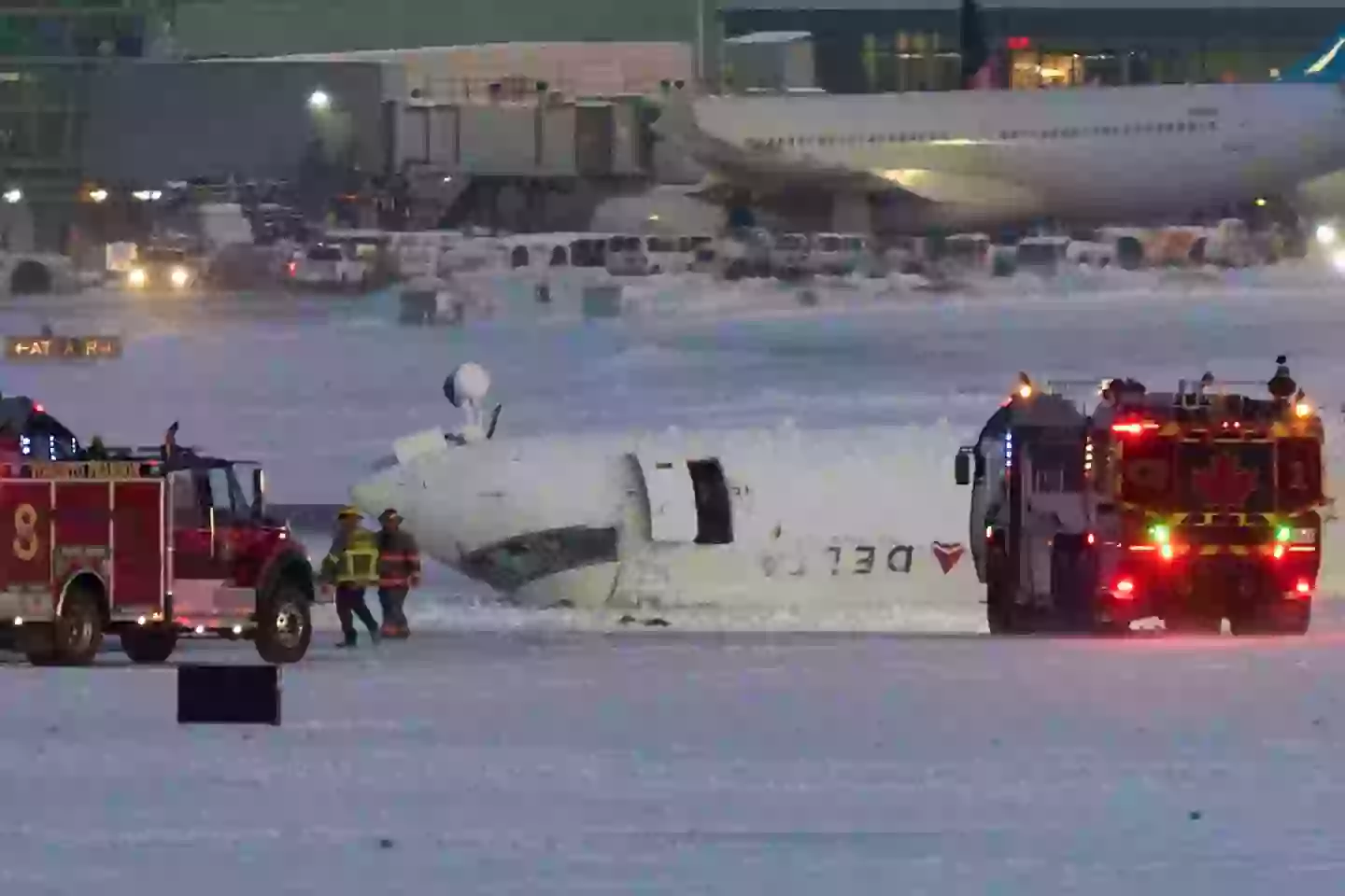 A Delta Airlines jet flipped upside-down after landing in Toronto (GEOFF ROBINS/AFP via Getty Images)