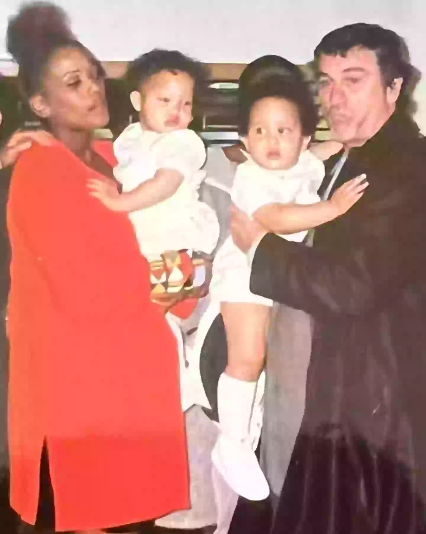 Airyn and her twin brother pictured back in the '90s being held by their parents Tookie Smith and Robert De Niro (Instagram/voiceofairyn)