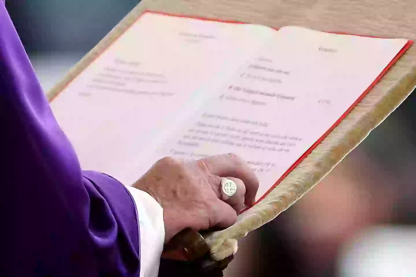 Pope Francis reads a passage from the Gospel, with the Fisherman's Ring on full display, back in 2016 (Vatican Pool/Getty Images)