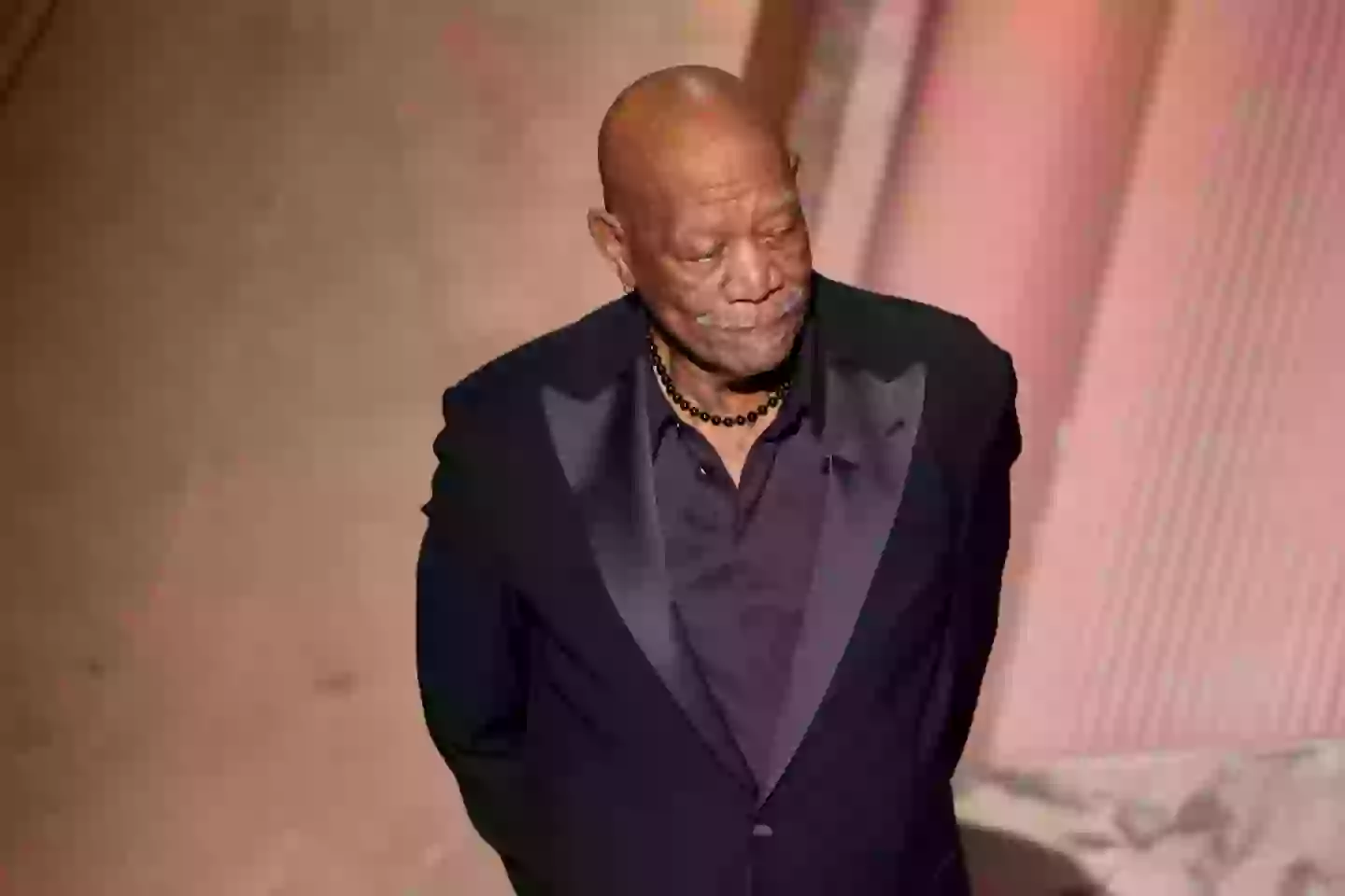 The actor had his hands behind his back for most of his speech (Rich Polk/Penske Media via Getty Images)