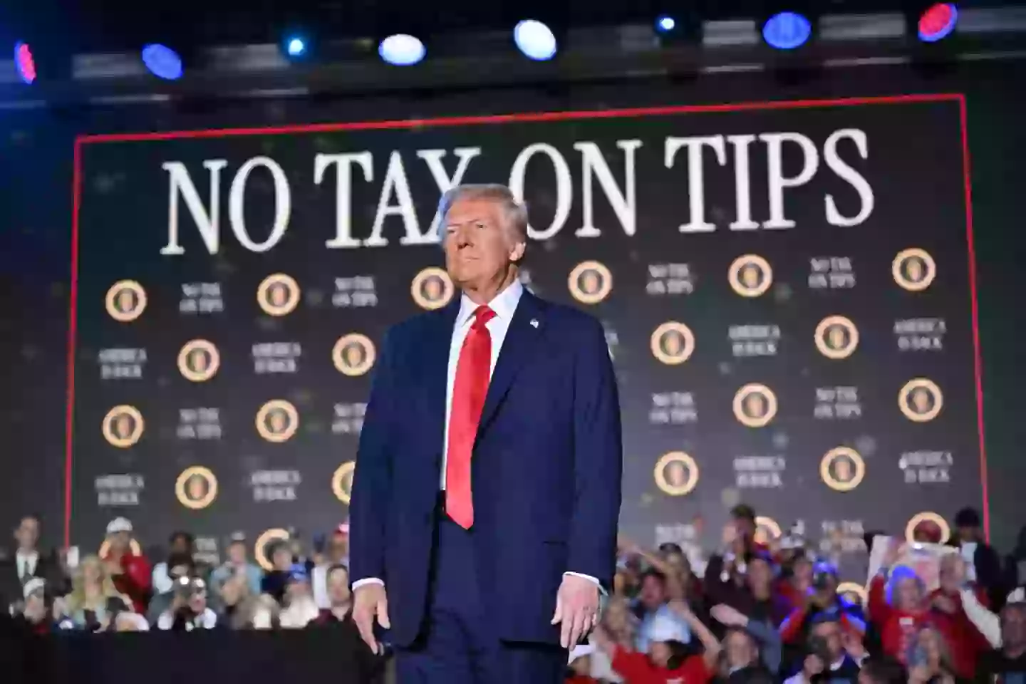 Trump has promised to slash taxes on tips for service workers (MANDEL NGAN/AFP via Getty Images)