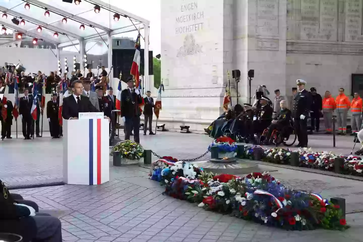 President Emmanuel Macron gave a speech beside the Tomb of the Unknown Soldier earlier this year (THOMAS SAMSON/POOL/AFP via Getty Images)
