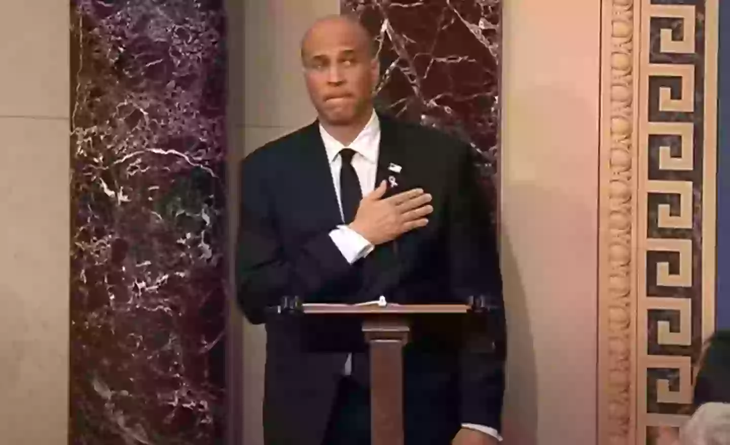 He covered his heart with his hand when he realised he had broken the record (CBS)