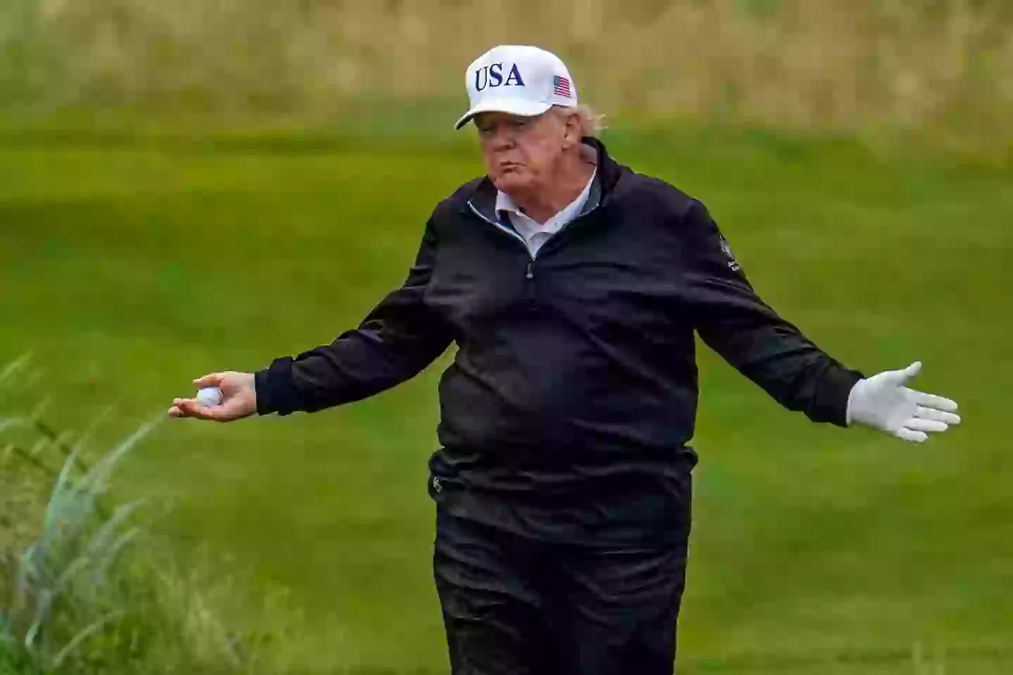 It's not the first time the president has been accused of cheating at golf (Christopher Furlong/Getty Images)