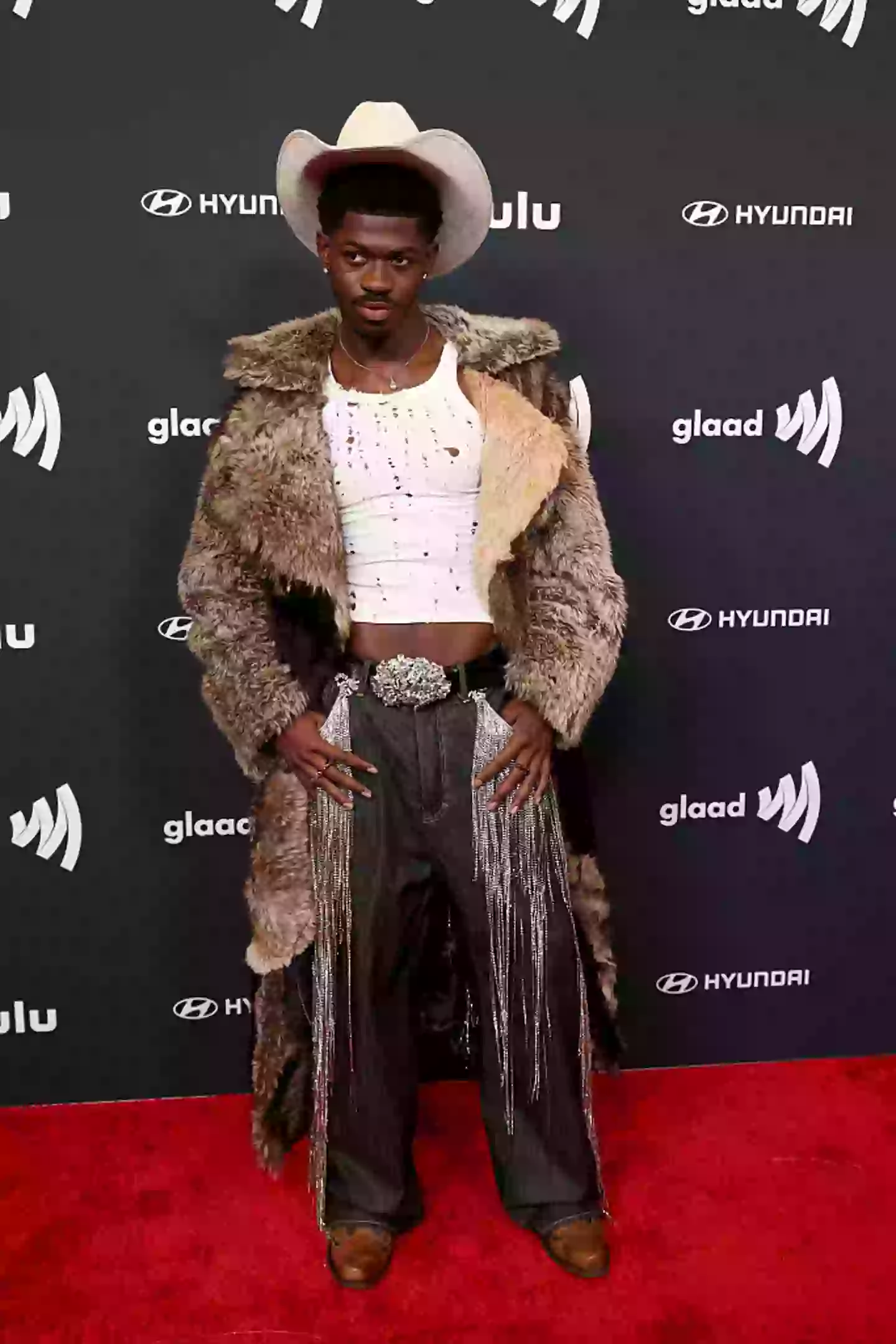 Lil Nas X has been charged with four felonies after he was allegedly caught wandering the streets of LA naked (Frazer Harrison/Getty Images)