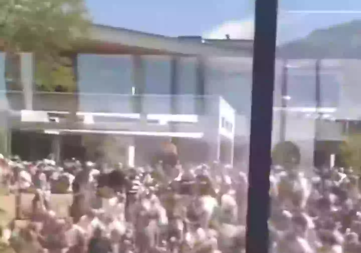 Multiple videos on social media have appeared to show someone on a university roof before and after the shooting