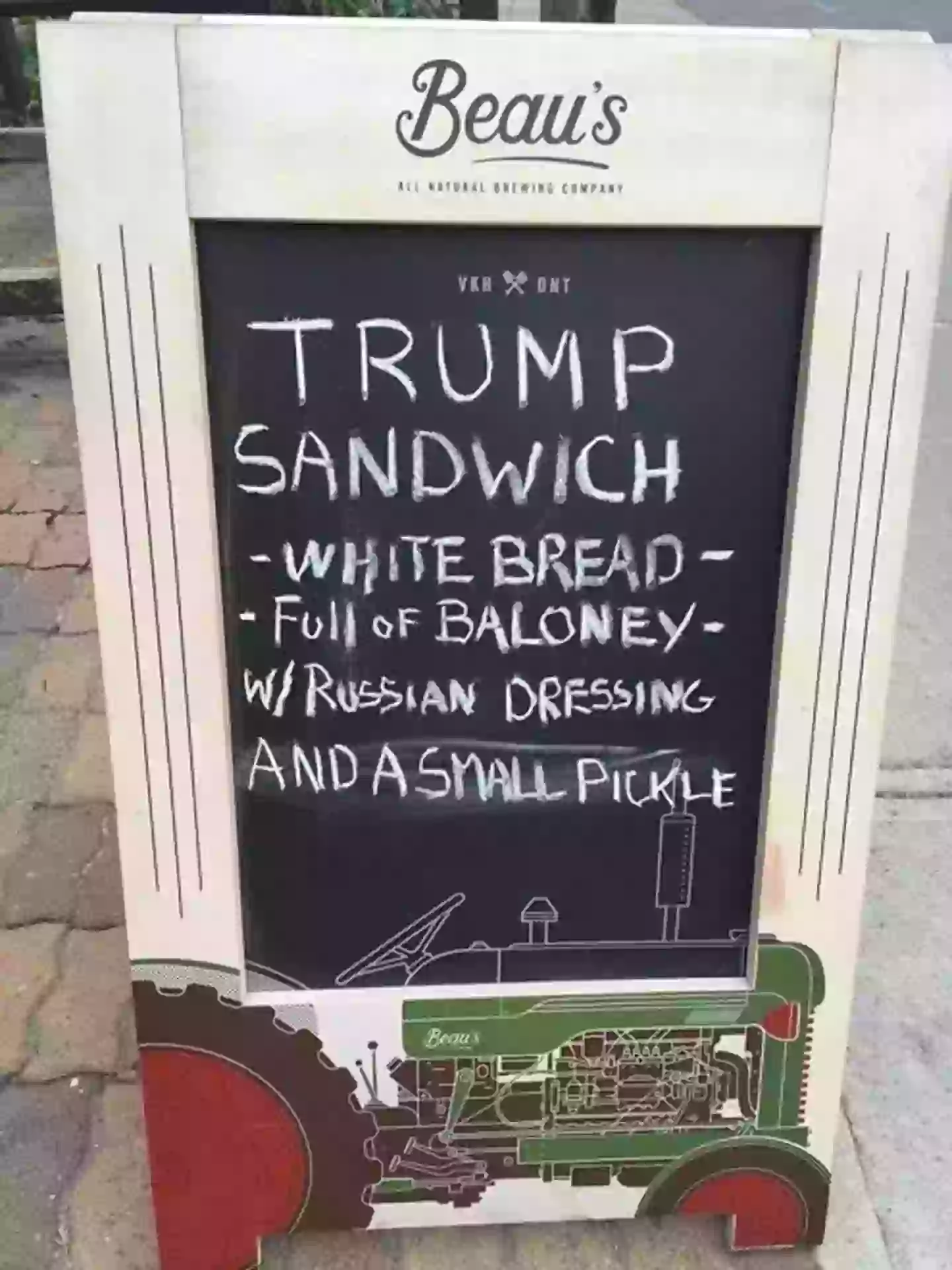 The hilarious A-board was spotted outside a cafe in Canada back in 2016 - during Trump's first term (X/@cheng_christine)