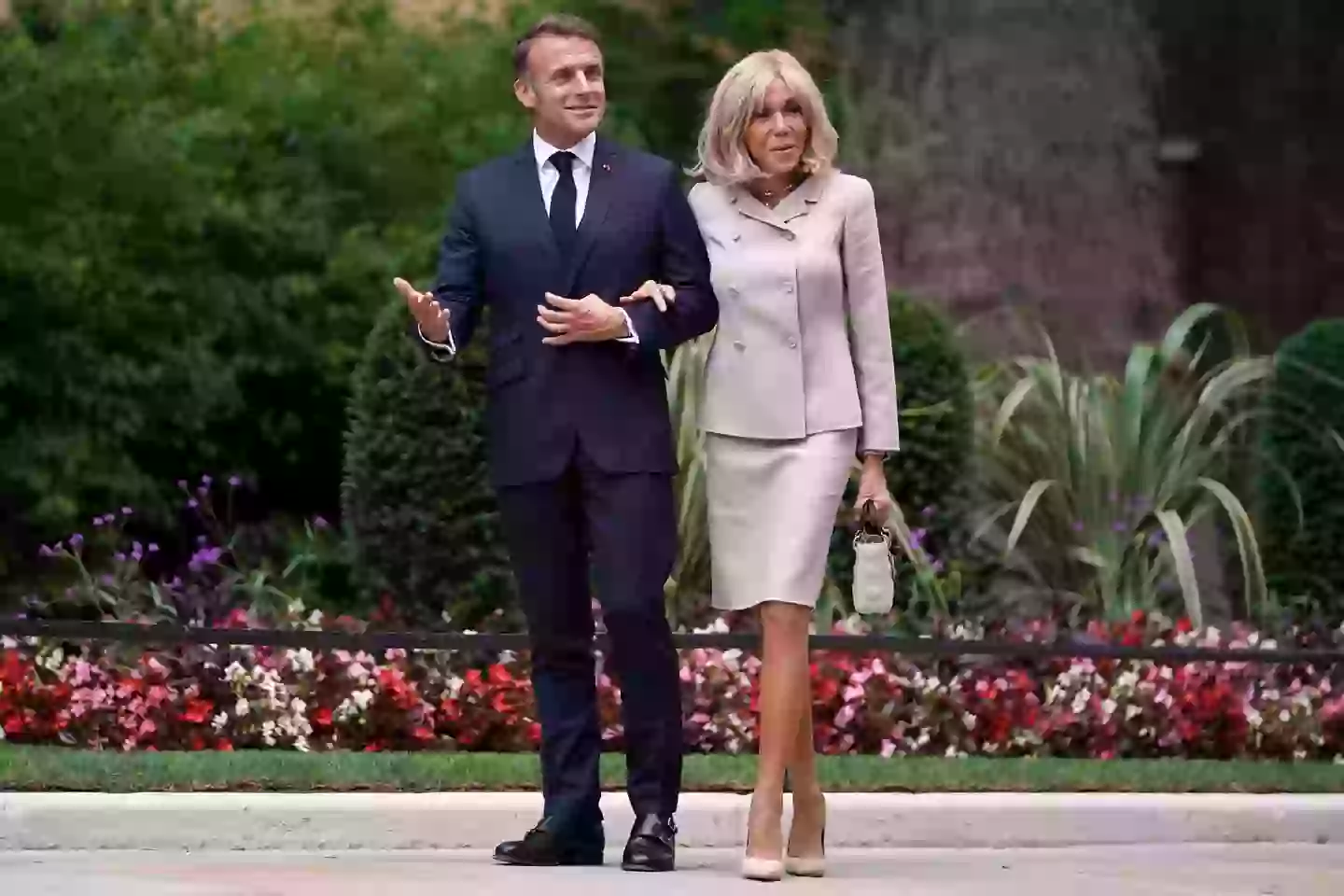 Macron and his wife have filed a lawsuit against Owens (Alberto Pezzali - Pool/Getty Images)