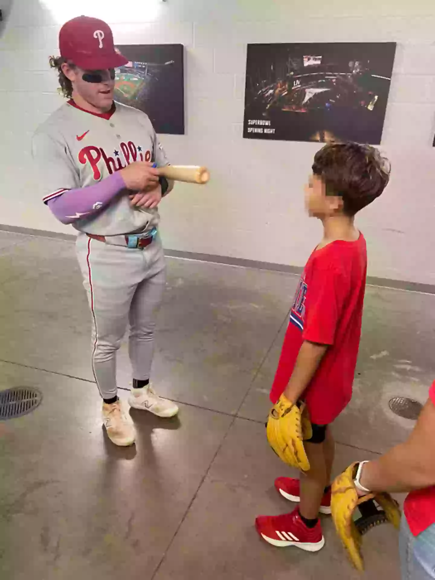 Bader gifted the boy a signed bat after the match (X/@Phillies)