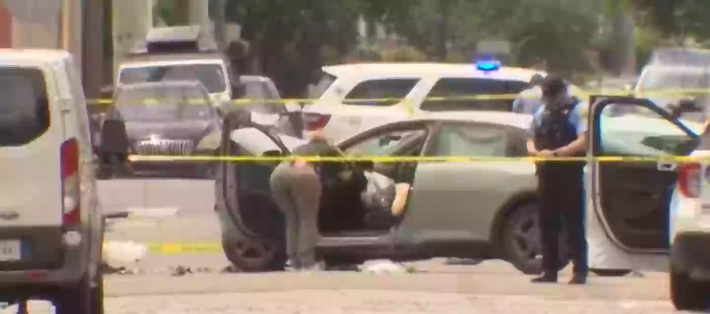 The suspect allegedly tried to flee the scene with the officer still attached to the car (WDSU)