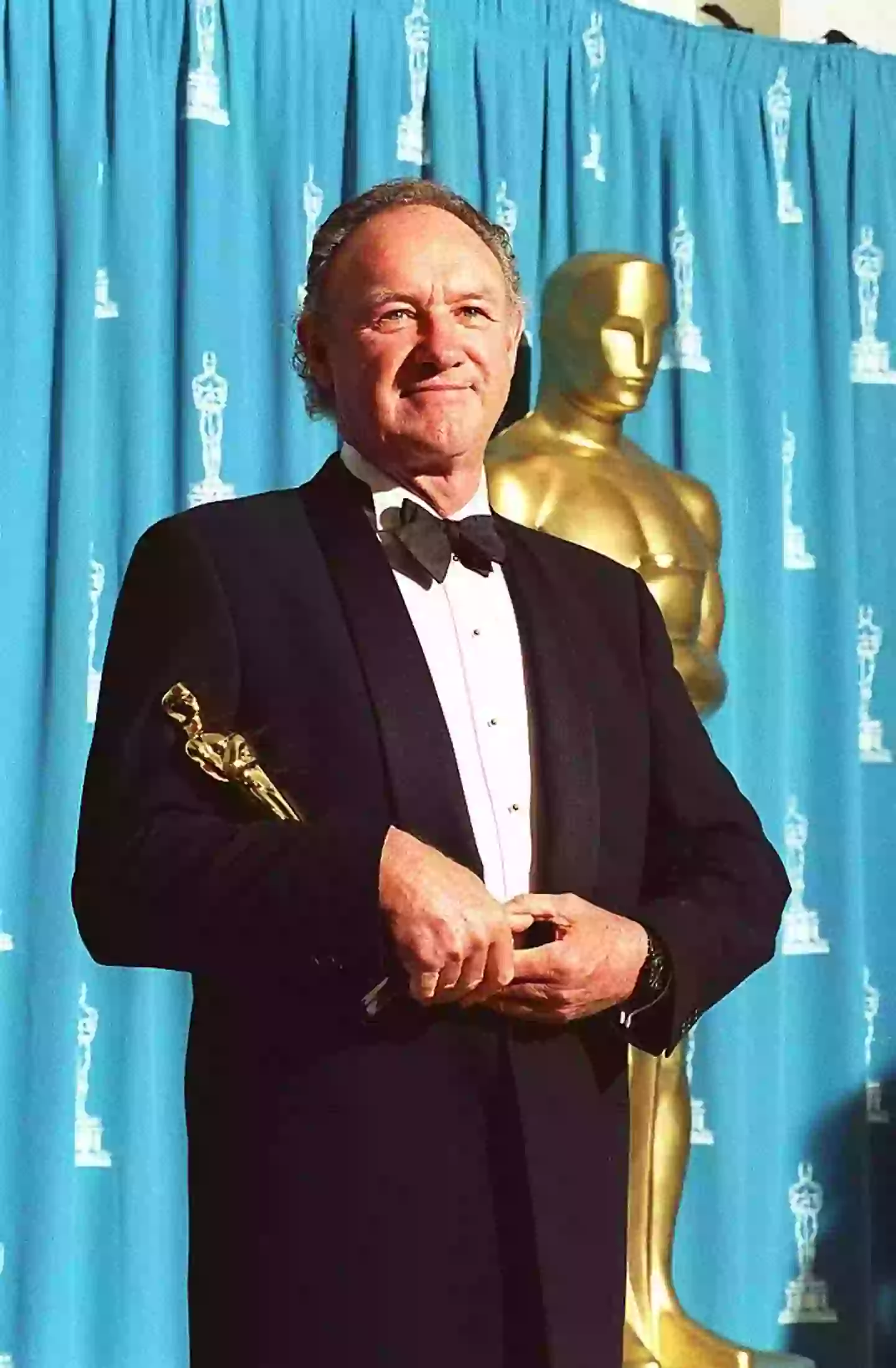 Hackman grips an Oscar at the 1993 Academy Awards (Avalon/Getty Images)
