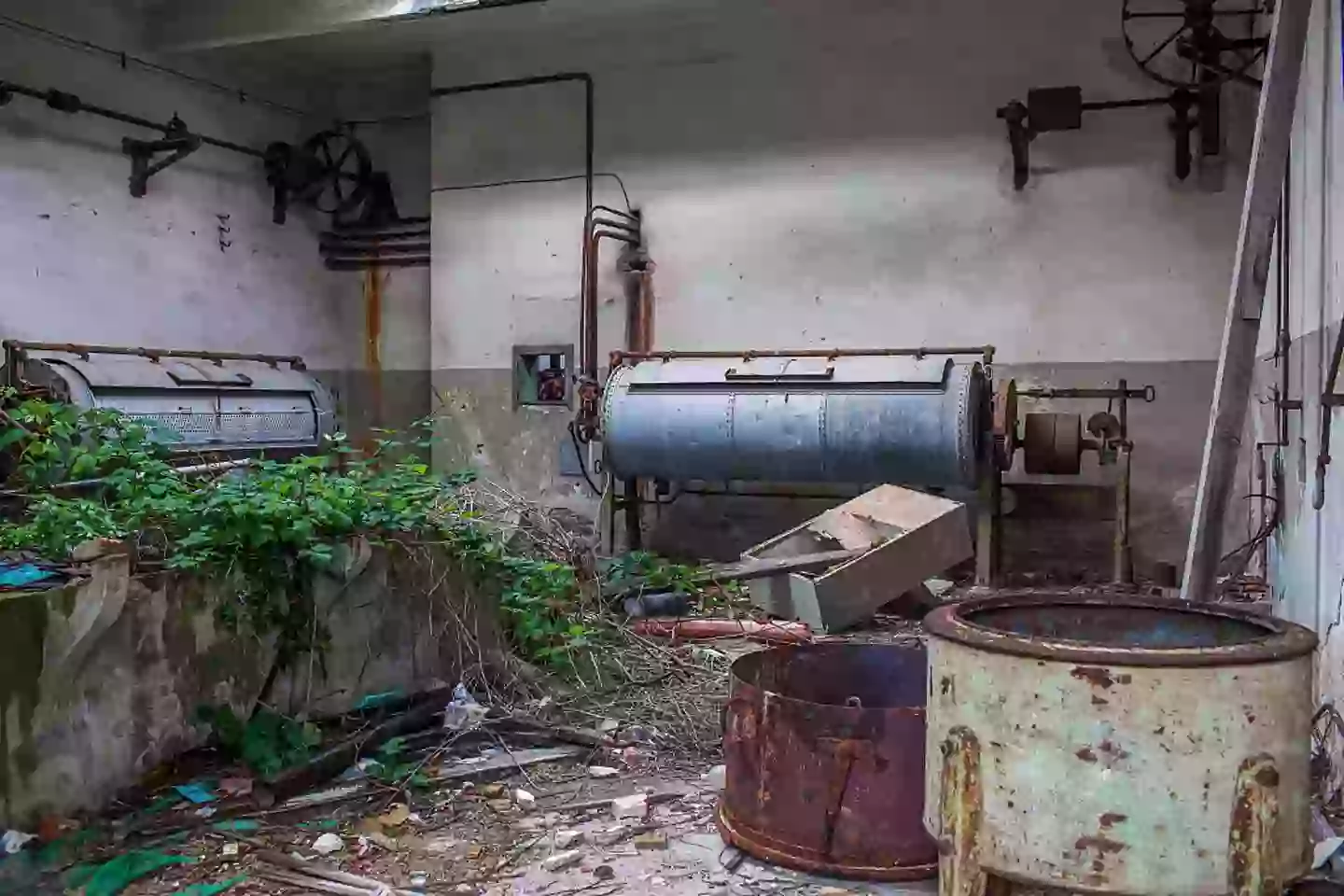 An eerie look inside the laundry room in one of the buildings of the 19th century Venetian geriatric hospital, located on Poveglia island (Marco Di Lauro/Getty Images)