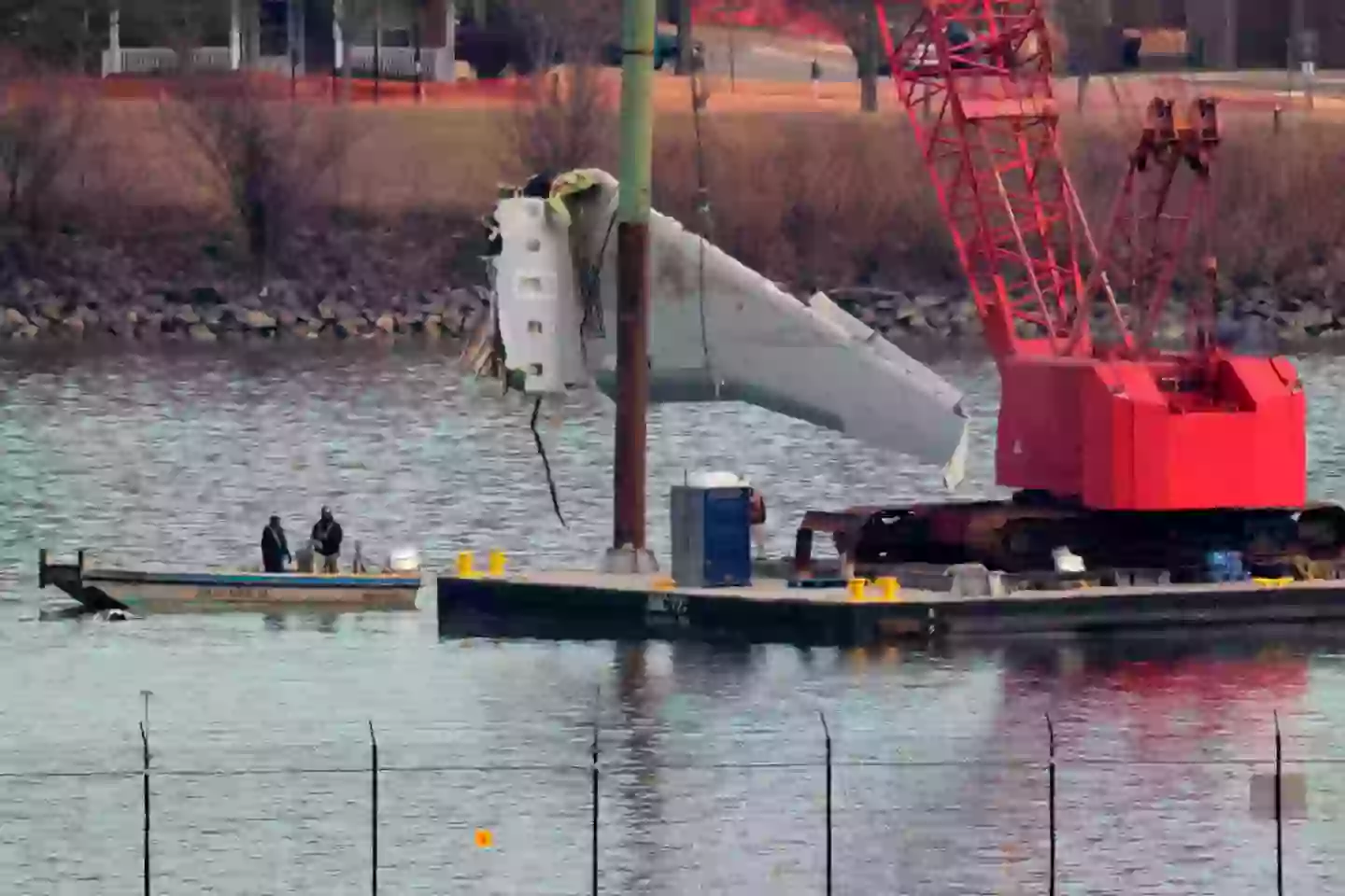 The wreckage being pulled from the Potomac River (Chip Somodevilla/Getty Images)