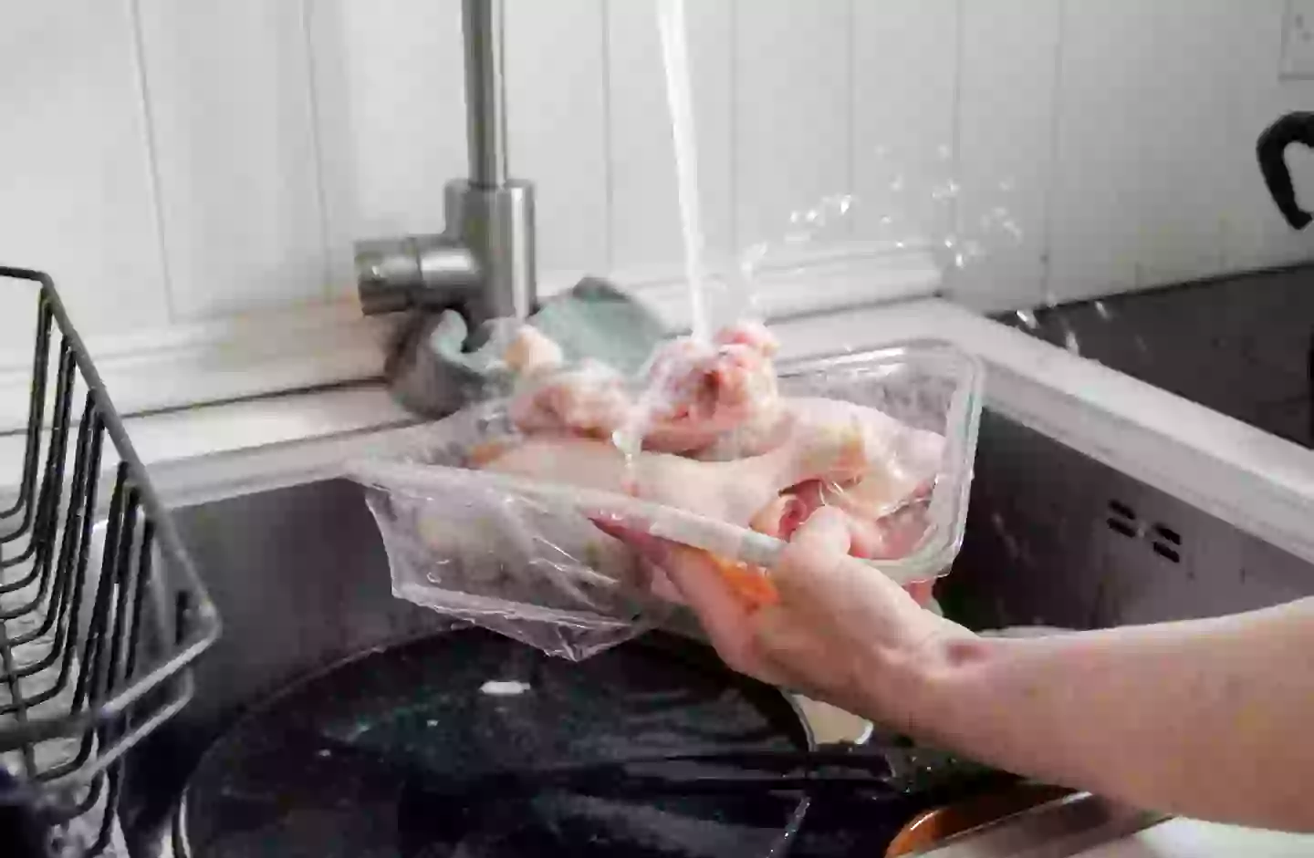 Washing your chicken isn't exactly the best idea healthwise (Getty Stock Image)