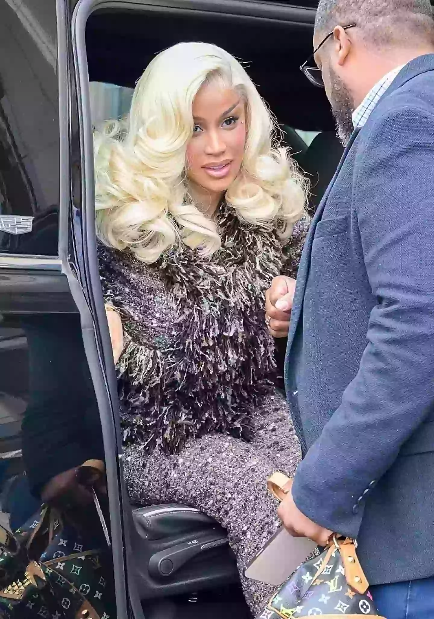Cardi wore a blond wig to court on Tuesday (MEGA/GC Images)