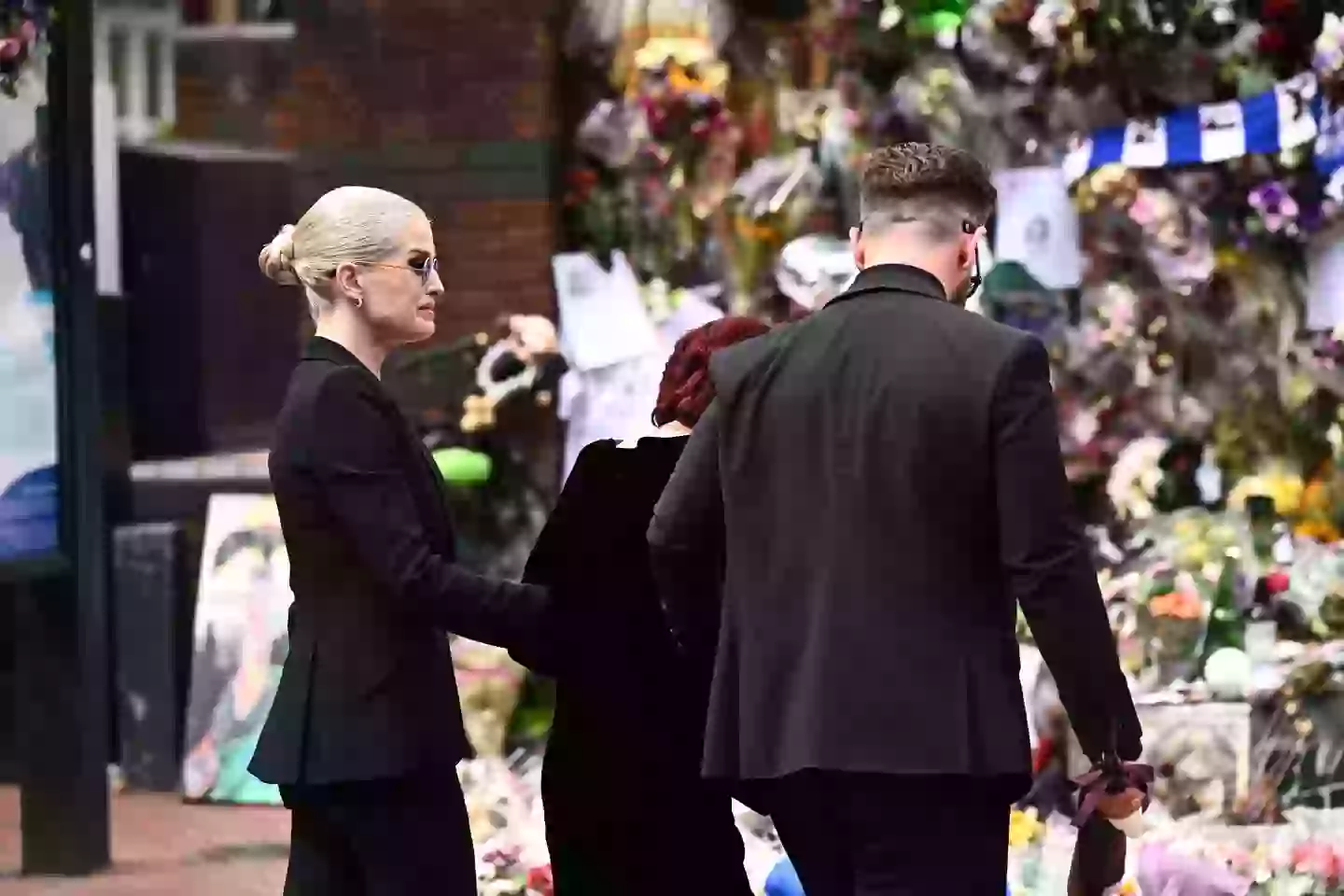 The streets of Birmingham were packed with Ozzy's fans who have left flowers and notes of love for the late singer (Leon Neal/Getty Images)