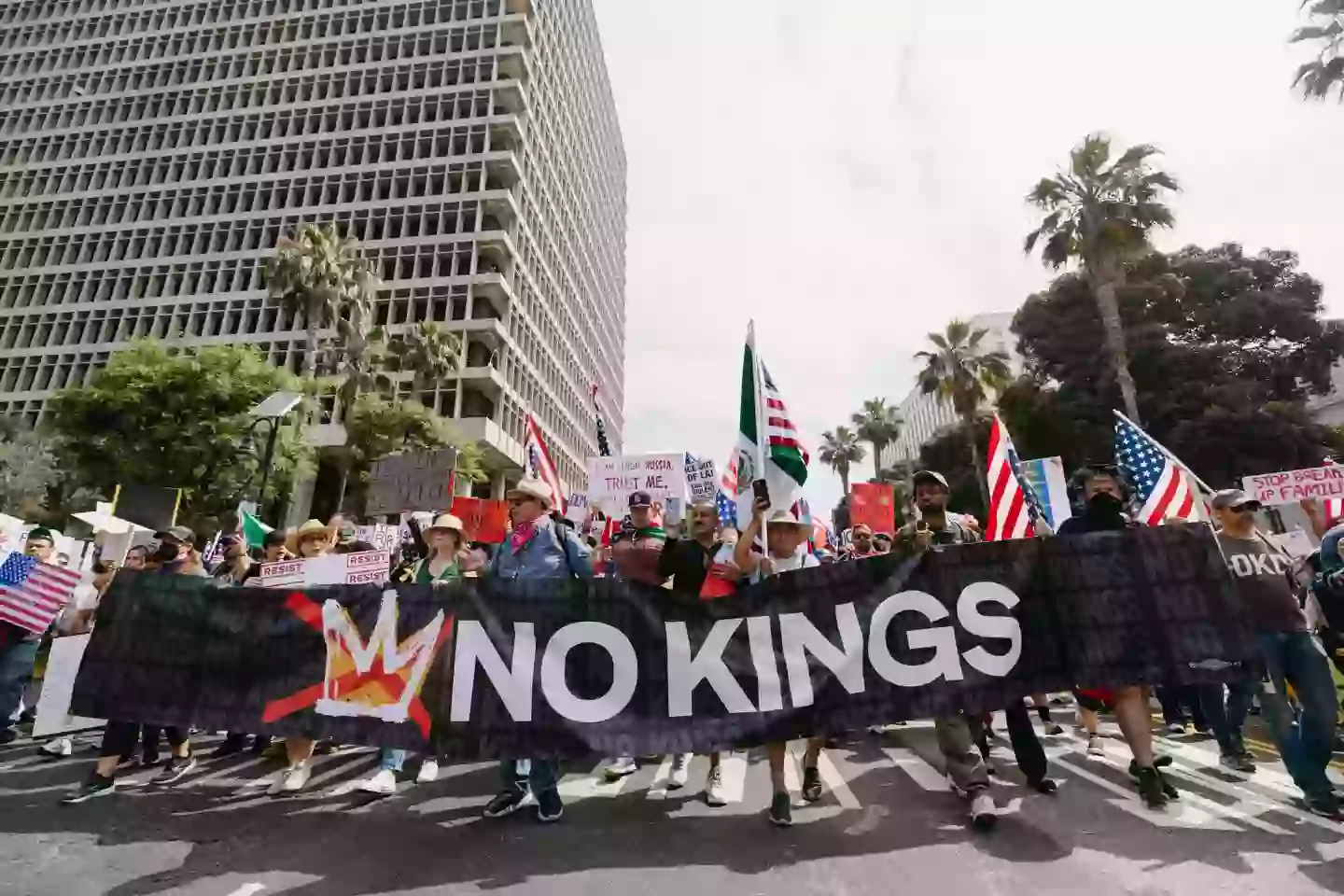 In recent weeks, Trump has been protested across the country (DAVID PASHAEE/Middle East Images/AFP via Getty Images)