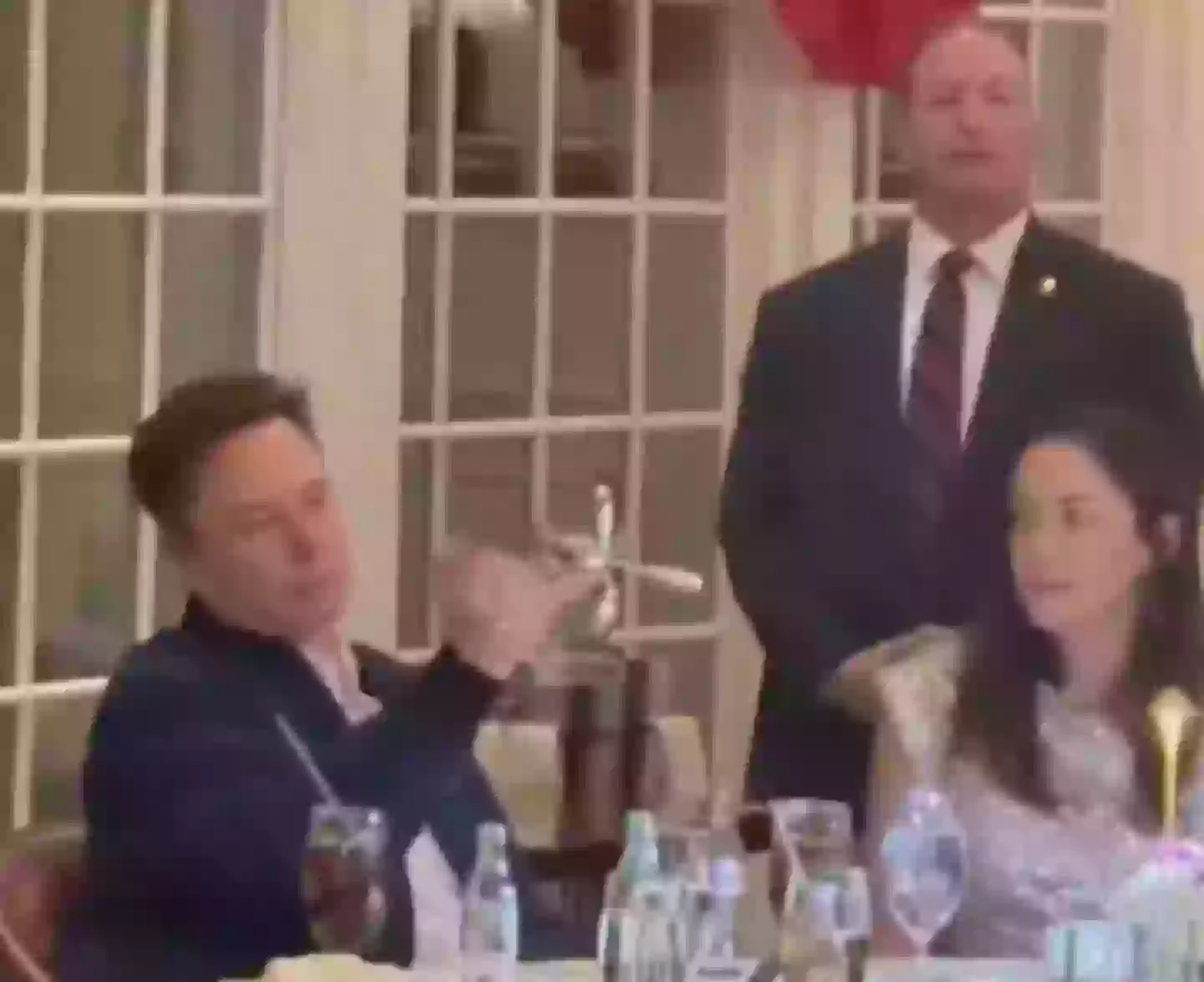 Elon Musk, playing with cutlery (Twitter)