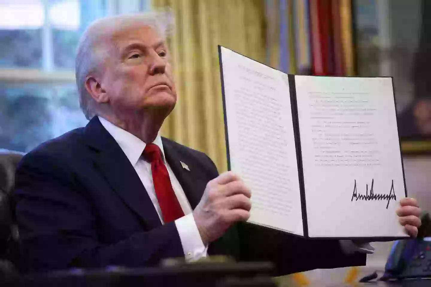 The signed executive order on foreign-made cars (Win McNamee/Getty Images)