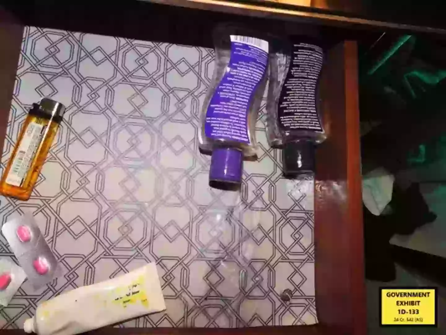 Lube and a lighter found in his nightstand (Department of Justice)