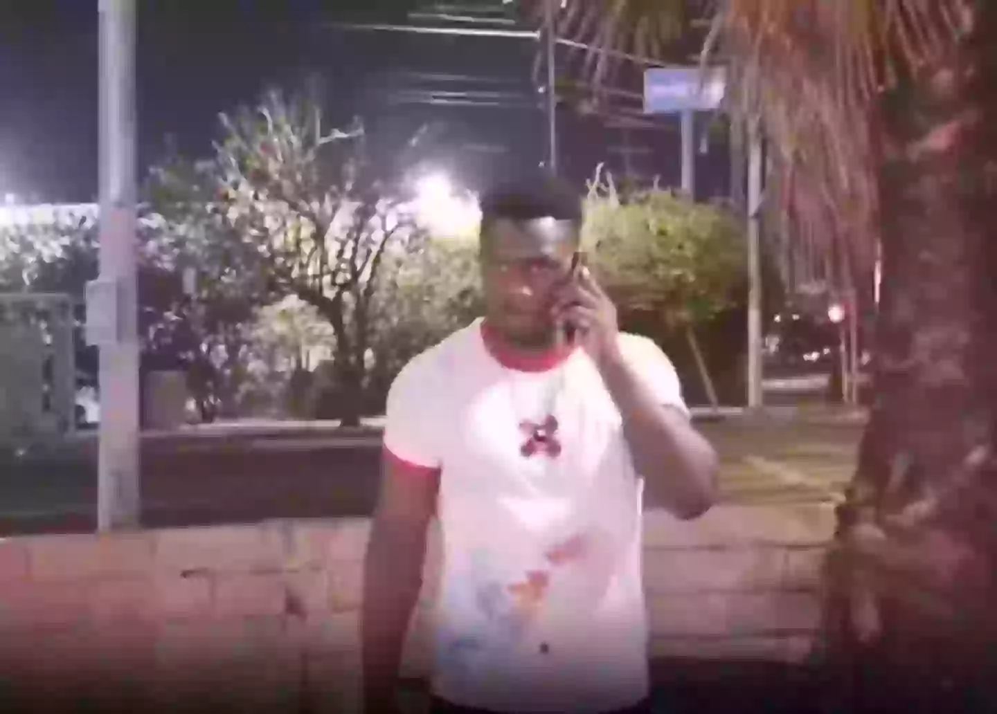 The fighter is reprimanded by the person on other end of the phone after the incident (@DahtSick/Twitter)