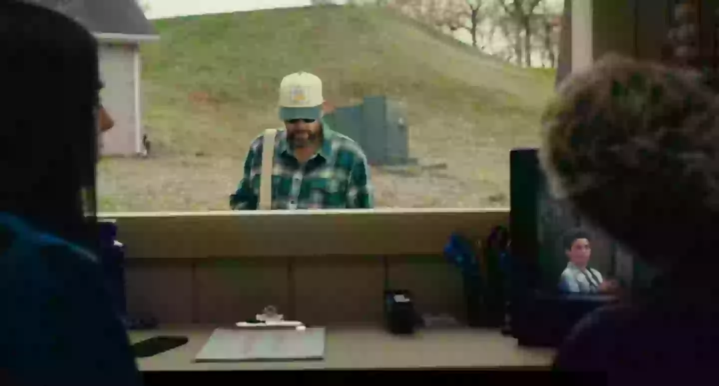 The scene shows Boyce on the TV (Netflix)