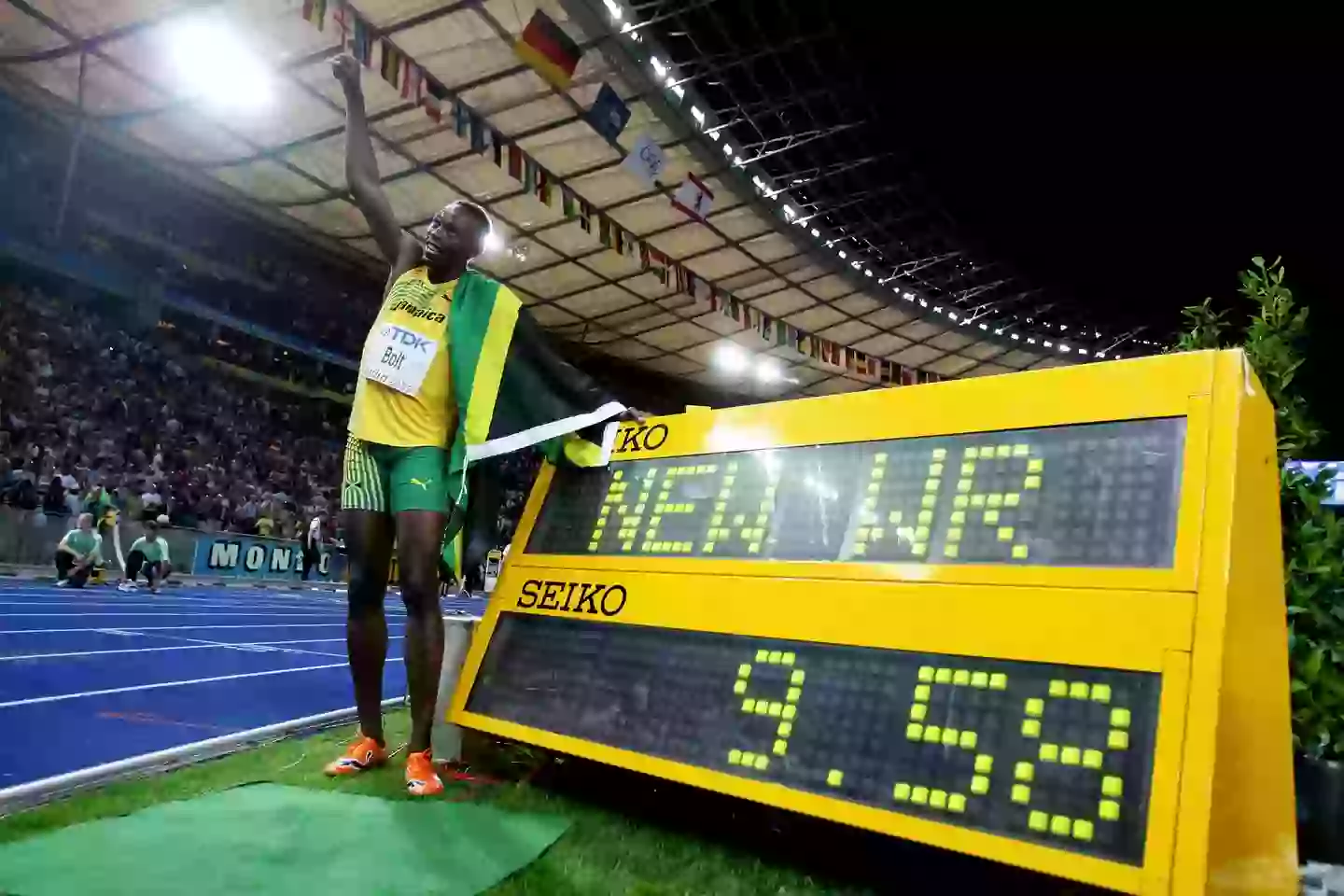 Usain Bolt with the 100m world record in 2009 (Image: Getty)