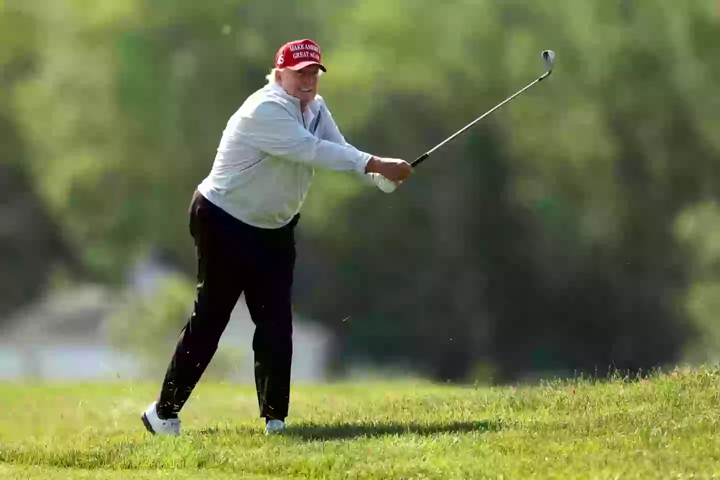 Donald Trump playing a round of golf. Image: Getty