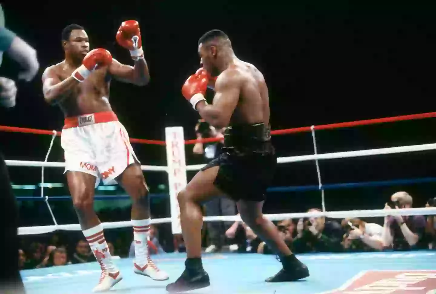 Larry Holmes and Mike Tyson fight for the WBA, WBC and IBF heavyweight tittle on January 22, 1988. Image credit: Getty