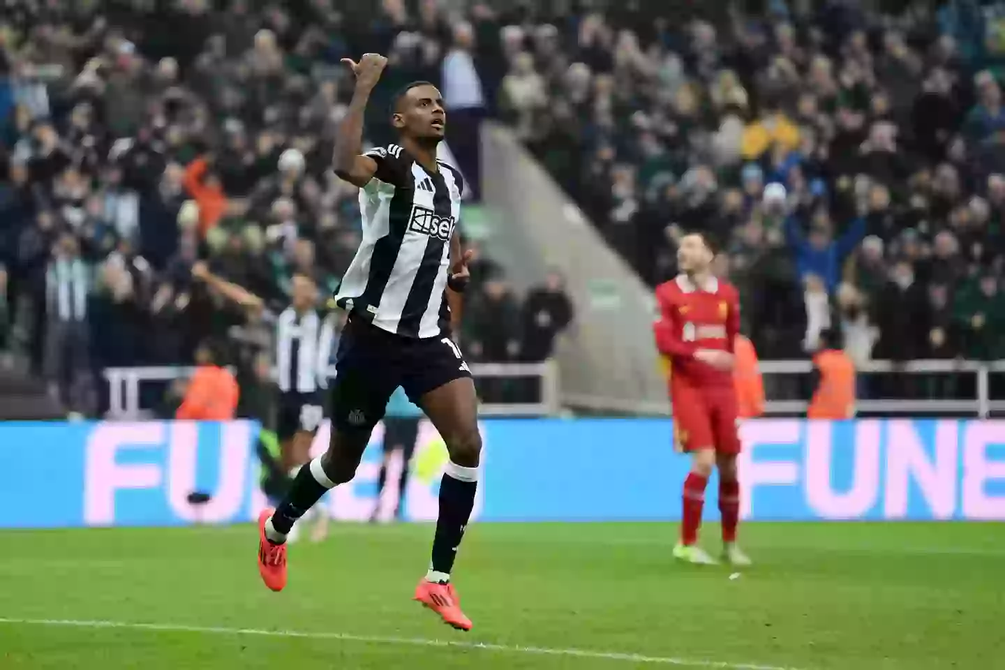 Alexander Isak celebrates scoring a goal against Liverpool. Image: Getty